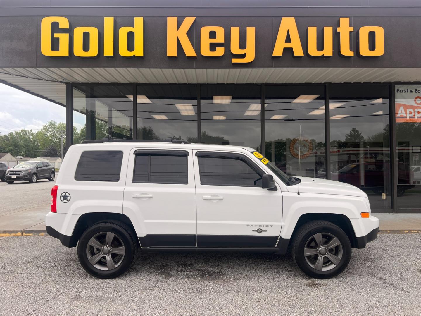 2013 Bright White Jeep Patriot Latitude 4WD (1C4NJRFB5DD) with an 2.4L L4 DOHC 16V engine, located at 1633 W Kimberly, Davenport, IA, 52806, (563) 323-5341, 41.559456, -90.598732 - Photo#0